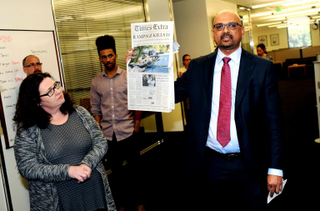Davan Maharaj, editor and publisher of the Los Angeles Times, announces the paper’s Pulitzer Prize awarded to Times reporters and editors in 2016. The Times won in the breaking news category for reporting on the terrorist shooting in San Bernardino, Calif., and the investigation that followed. (University of California, Riverside)